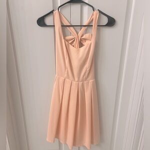 Pink open-back with bow dress